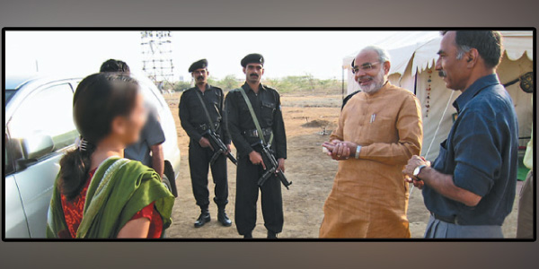 The police released surveillance images of the young woman who met Modi in Gujarat sensation
